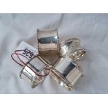 A group of four various napkin rings Sheffield 1922 etc. - 74 gms