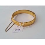 A rolled gold bangle