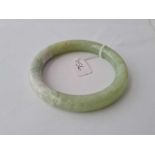 A green hard stone bangle