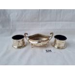 A pair of circular salts (sterling) and a boat shaped salt B'ham 1903 - 84 gms