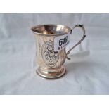 A small Victorian baluster shaped christening mug with embossed panels 3 inches high B'ham 1862 by