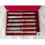 A set of six silver handled fancy tea knives