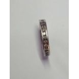 A DIAMOND ETERNITY RING SET IN PLATINUM 0.9 CTS SIZE J - 6.5 GMS