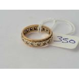 A stone set eternity ring 9ct - 3.6 gms