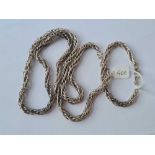 A silver necklace and matching bracelet 74g