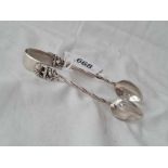 A pair of Indian silver sugar tongs decorated with a elephant - 41 gms