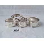 A group of four various napkin rings - 50 gms