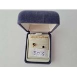 A boxed pair of sapphire earrings 9ct