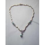 A TURQUOISE AND DIAMOND NECKLACE IN 14CT GOLD - 23.4 GMS INC.