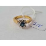 A sapphire and diamond cluster ring 18ct gold size O - 4.8 gms