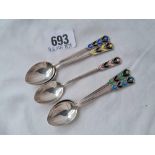 Five art deco style enamel decorated coffee spoons, B;ham 1935 with silver jubilee mark,