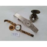 Two ladies watches and metal cased gents watch with a black face