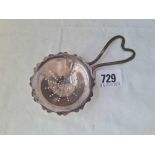 A tea strainer with handle, 5” wide, B'ham 1943 by J.E