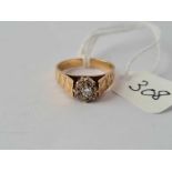 A Small single stone diamond ring 9ct size I