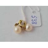 a pair of pearl clip earrings 14 ct gold