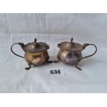 A pair of mustard pots on pad feet B'ham 1915 - 87 gms exc BGL