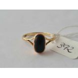 A 9ct black stone ring