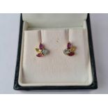 A pair of boxed modern gem set earrings in 9ct