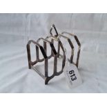 A five bar toast rack with ring handle bracket feet 3 1/4 inches wide B'ham 1938 - 81 gms