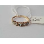 An opal & diamond 9ct part hoop ring size N