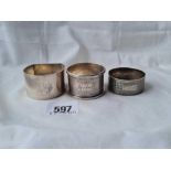 A group of three napkin rings London 1945 etc. - 88 gms