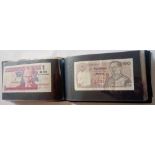 Book of assorted worldwide bank notes