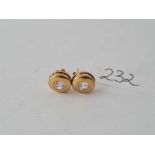 A pair of 9ct white stone ear studs 1.5g inc