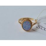 A large oval opal doublet ring 9 ct size M1/2 - 2.6 gms