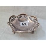 A pierced hexagonal dish on three legs, 4” dia, London 1925, w.50g