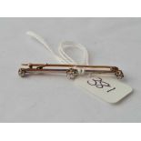 A gold bar brooch set with three diamonds 1.7g inc