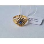 A sapphire and diamond cluster ring ( B'ham 1915 ) in 18 ct gold size O - 2.8 gms