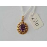 A small amethyst pendant in fancy 9ct mount 2.4g inc