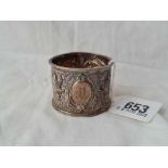 A good napkin ring embossed with infants and foliage Sheffield 1897