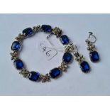 A EARLY VICTORIAN SILVER AND PASTE BLUE AND WHITE BRACELET AND EARRINGS