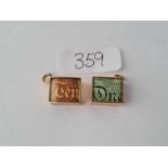 Two 9ct charms one £1 and 10 shillings 6.5g inc