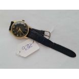 A gents Nisus Jubile wrist watch with black face and seconds sweep w/o