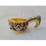 A silver gilt & enamel decorated salt with handle, 4” wide