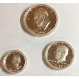 1976 USA proof dollar, 1/2 dollar and two 5c