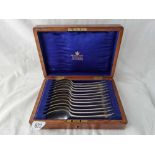 A box set of twelve OE pattern dessert spoons Sheffield 1905 by M&W - 335 gms