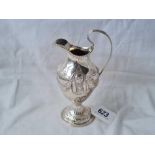 A Adams style urn shaped cream jug embossed with drapery etc. 6 inches high London 1775 - 110 gms