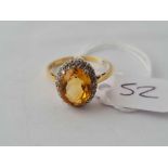 A citrine and diamond cluster ring in 18ct gold size P1/2 - 3.9gms