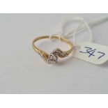 A diamond crossover ring 9ct size S - 1.6 gms