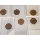 Canadian one cent coins, uncirculated: George V 1932, 1934, 1921. George VI 1943/1943 and Queen