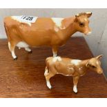 A Beswick Gurnsey cow & calf