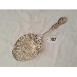 A large cast decorative continental spoon, the bowl embossed with sailing boat - 81 g.