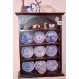Shelf with blue & white willow pattern plates & other items