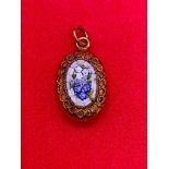 A small oval Victorian pendant with micro mosaic panel to front