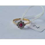 A Edwardian ruby and white sapphire cluster ring 9ct size O1/2 - 1.2 gms