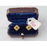 A pair of cased cufflinks 14ct gold