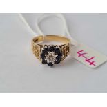 A sapphire and diamond cluster ring 9ct size O -3.9 gms